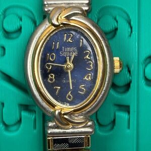 Times Square Quartz Women's Oval Blue Dial Two Tone Watch Tested